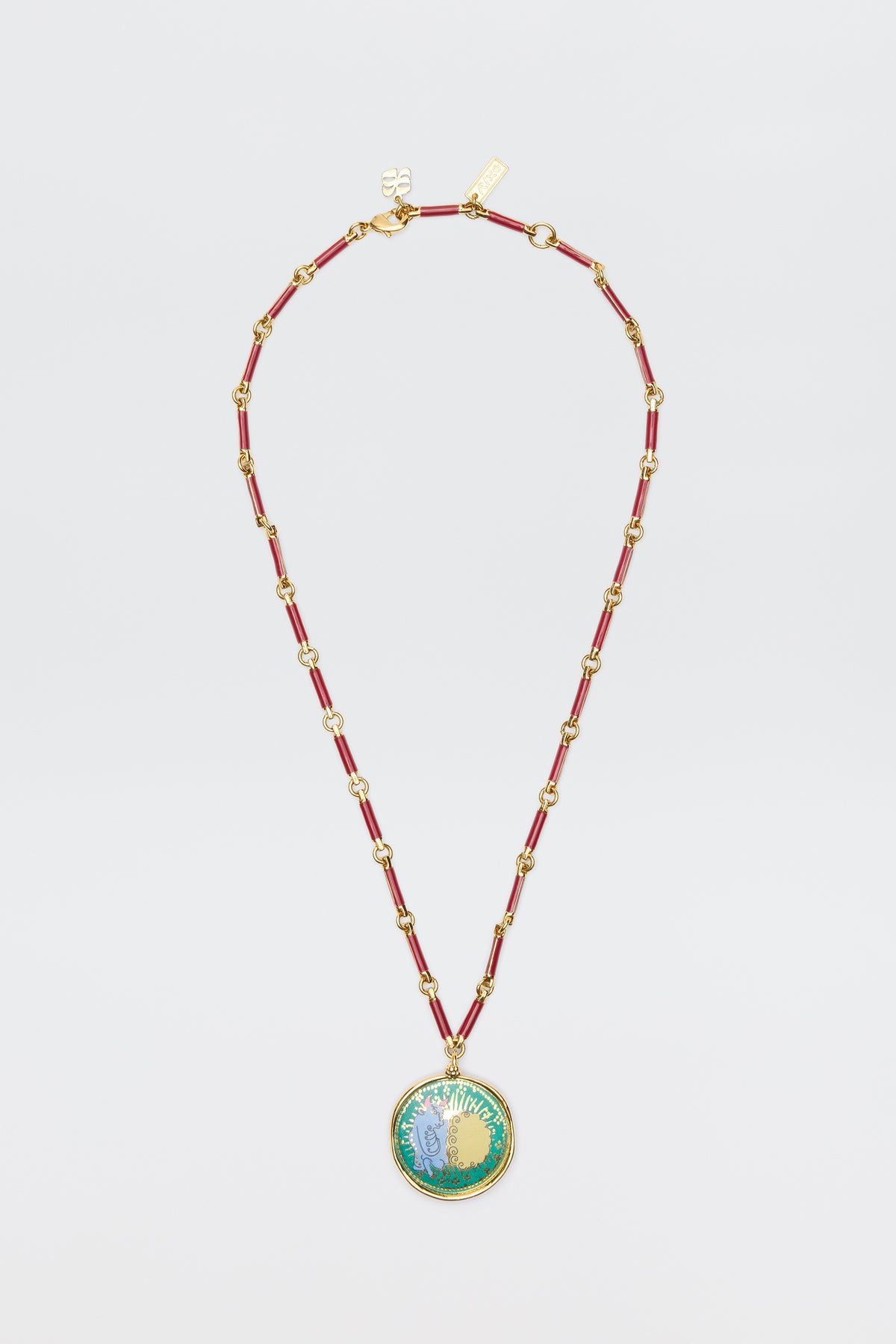 Ari - Astro Taurus: Gold chain necklace with red enamel links and a round pendant featuring a vibrant floral design, shown on a white background—a stylish zodiac accessory for any occasion.