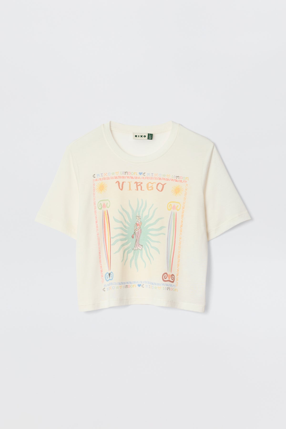 The Ria - Virgo is a white cropped short-sleeve t-shirt with a colorful artistic Virgo print, suns, symbols, and pastel accents on the front. Perfect for pairing with RIXO skirts. Shown against a plain white background.