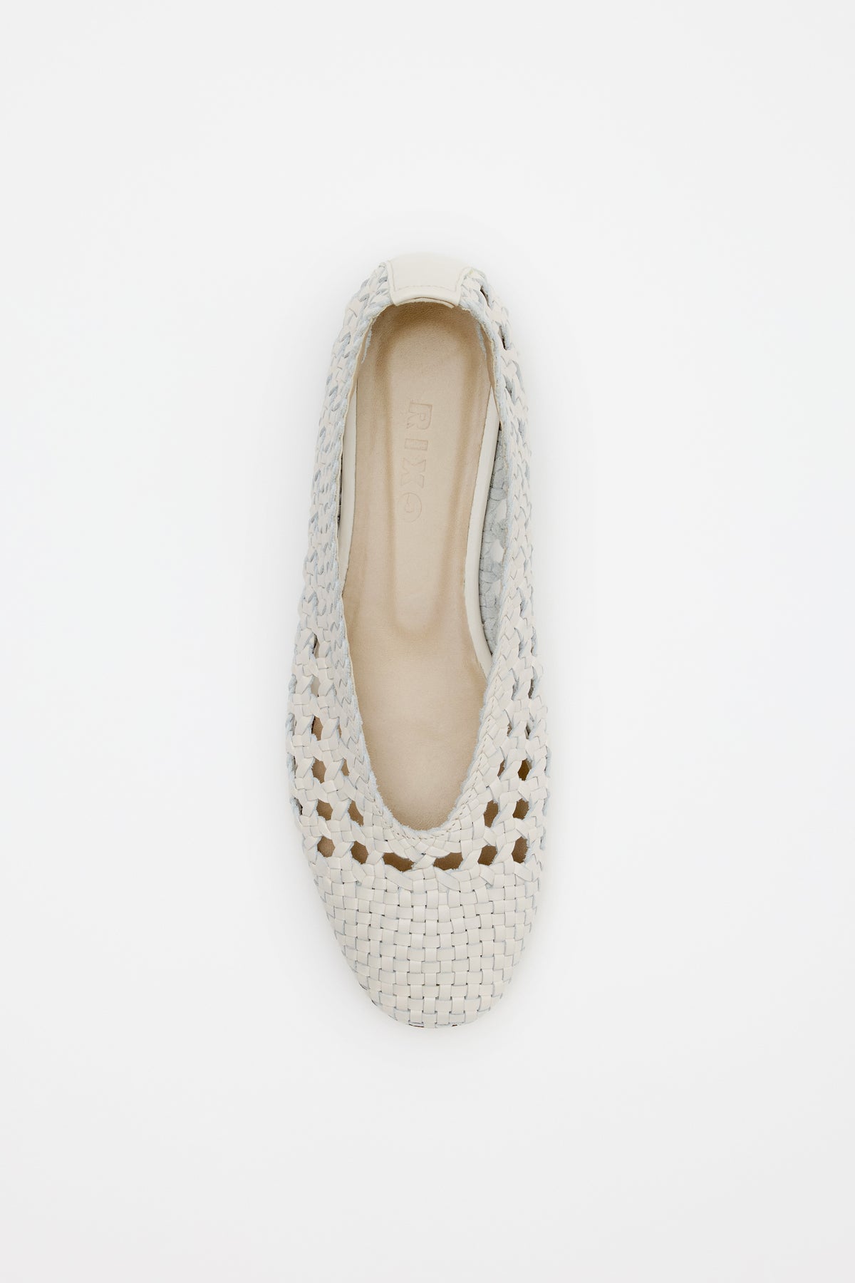A top view of the Marlia - Cream flat shoe, featuring a light beige woven design with a round toe and open-weave pattern, displayed on a white background.