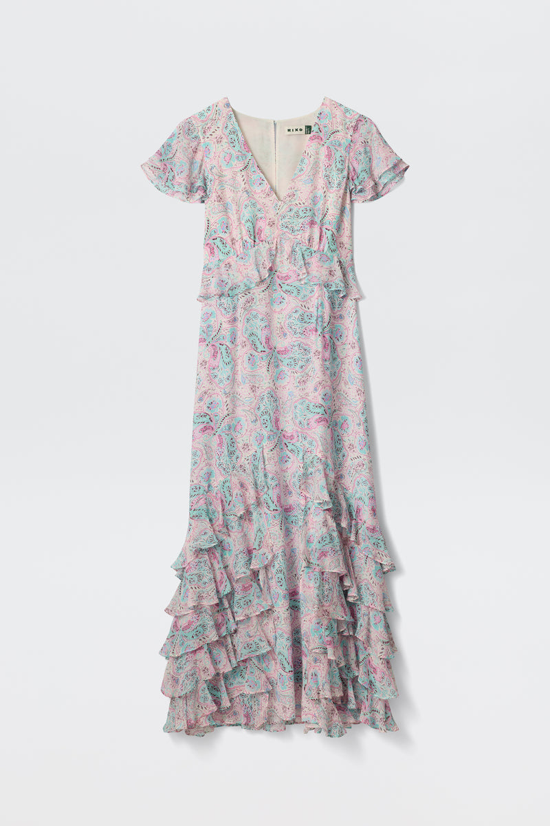 The Thanvi - Butterfly Paisley Cream gown is a long, pastel dress with flutter sleeves, a V-neckline, and layered ruffles—ideal as a romantic wedding guest dress—shown against a plain white background.