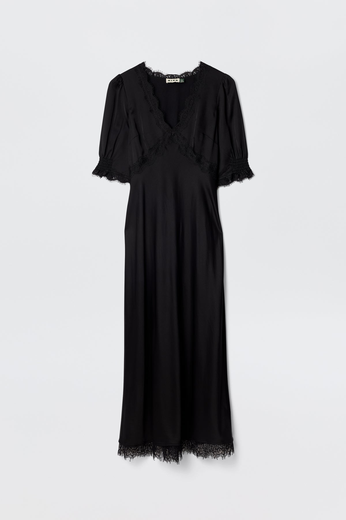 Annina - Black: A bias-cut black midi dress with lace trims on the V-neckline, sleeves, and hem. The short-sleeved, ankle-length silhouette is showcased elegantly against a plain white background.