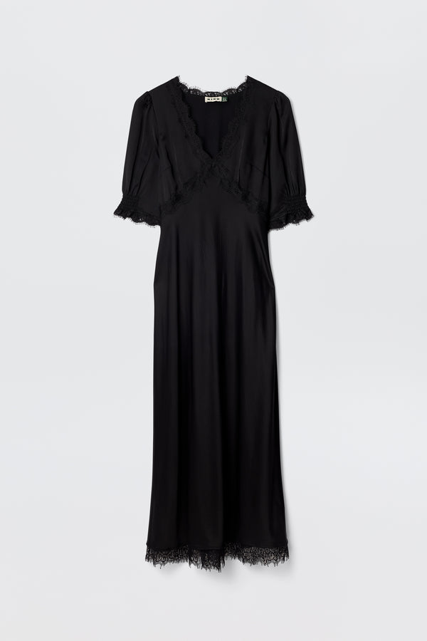 Annina - Black: A bias-cut black midi dress with lace trims on the V-neckline, sleeves, and hem. The short-sleeved, ankle-length silhouette is showcased elegantly against a plain white background.