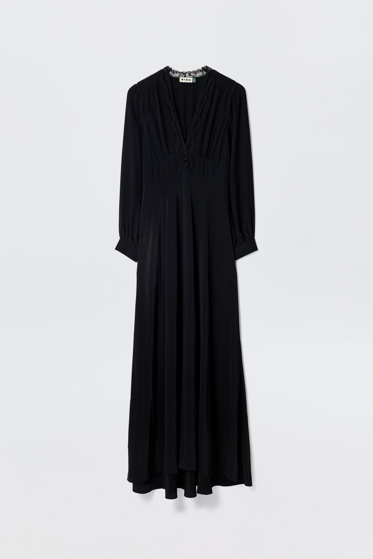 Presenting “Emory - Black”: a long-sleeved, floor-length dress made from luxurious black silk crepe de chine, designed with a V-neckline and subtle waist gathers. Shown against a plain white background, this elegant piece is perfect for special occasions.