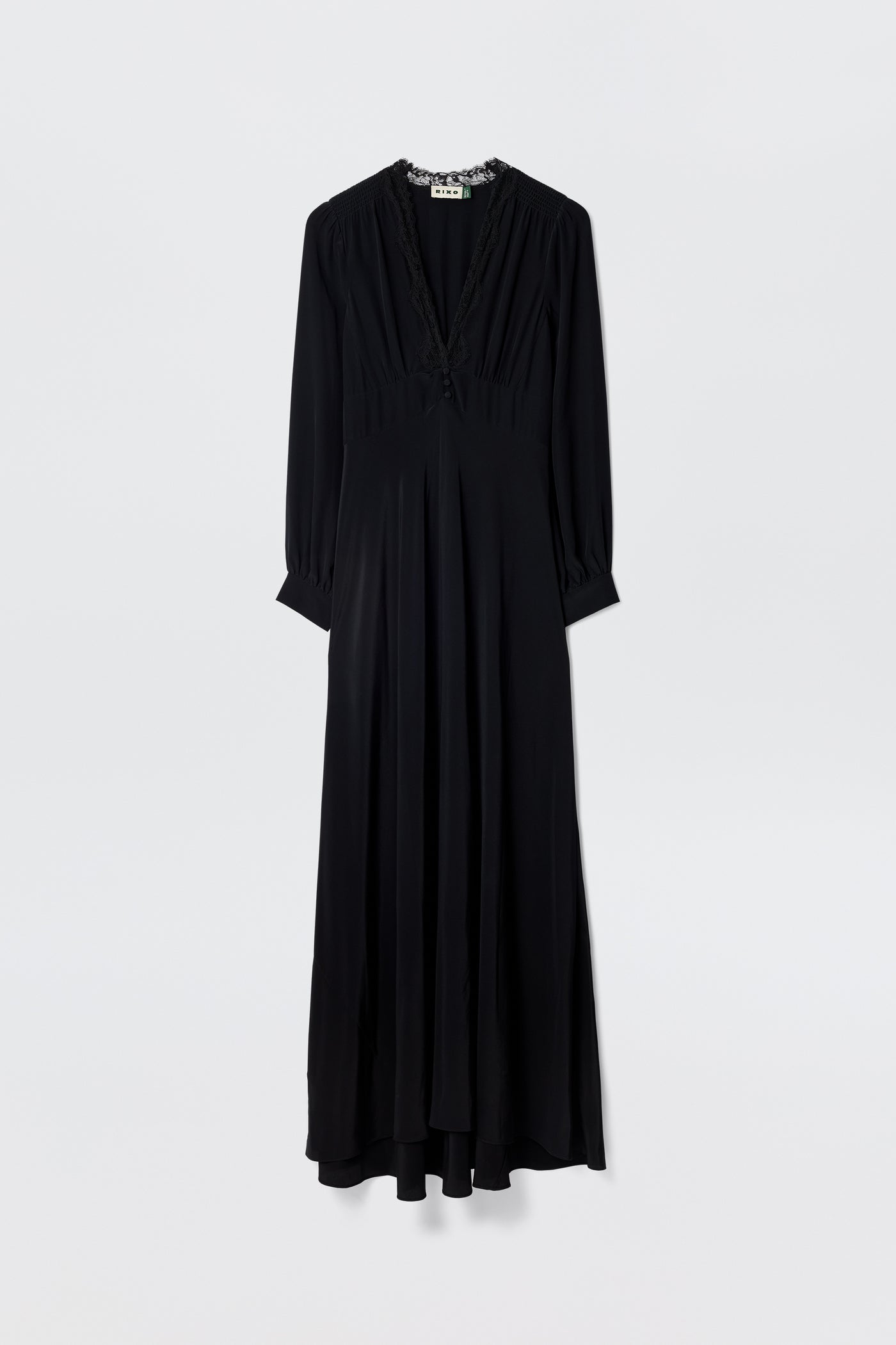 Presenting “Emory - Black”: a long-sleeved, floor-length dress made from luxurious black silk crepe de chine, designed with a V-neckline and subtle waist gathers. Shown against a plain white background, this elegant piece is perfect for special occasions.