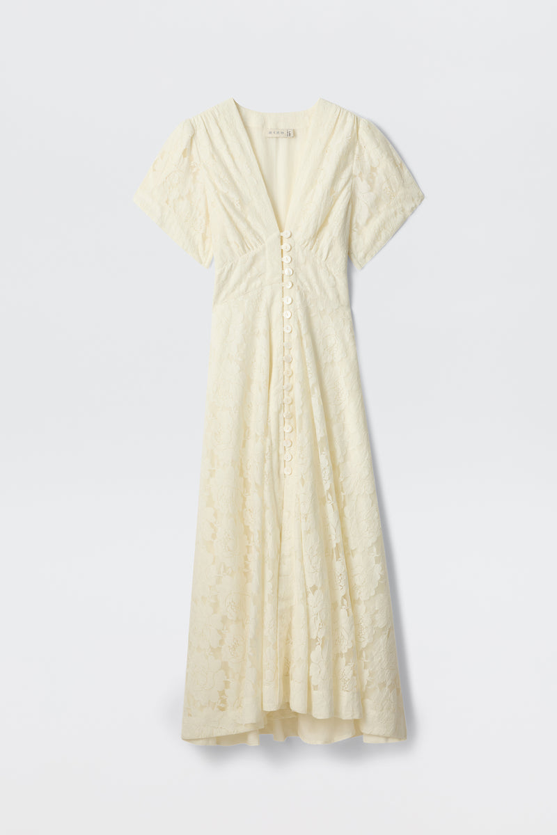 The Novara - Ivory is a short-sleeve, ivory vintage dress with floral lace, V-neck, fitted waist, button-down front, and flared skirt, shown against a plain white background.