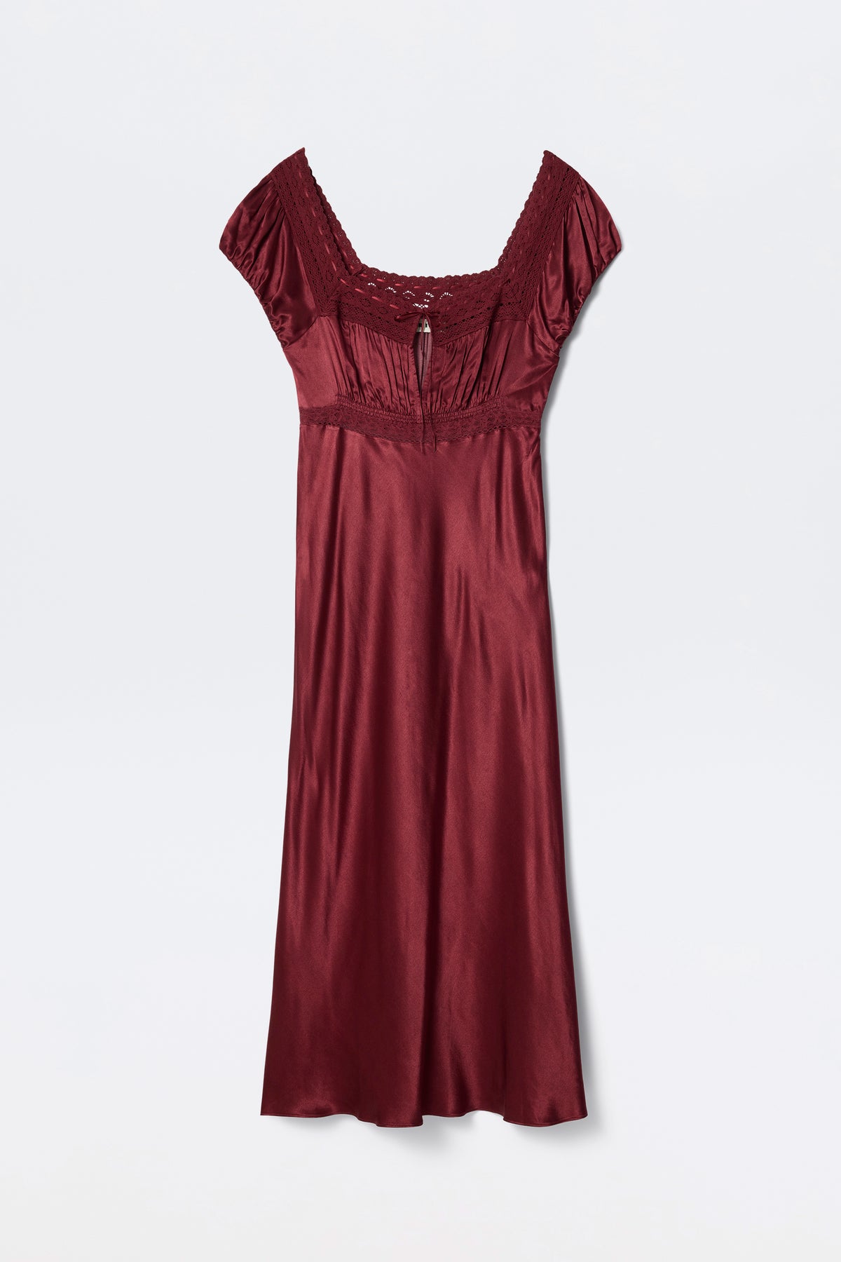 The Maeva - Maroon is a burgundy satin dress with short sleeves, lace-trimmed square neckline, gathered bust detail, and a slightly flared skirt, shown against a plain white background.
