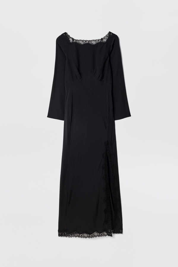 The Mirena - Black is a long black dress featuring long sleeves, a scoop neckline, and delicate lace trim along the neckline, hem, and side slit. Displayed against a plain white background.
