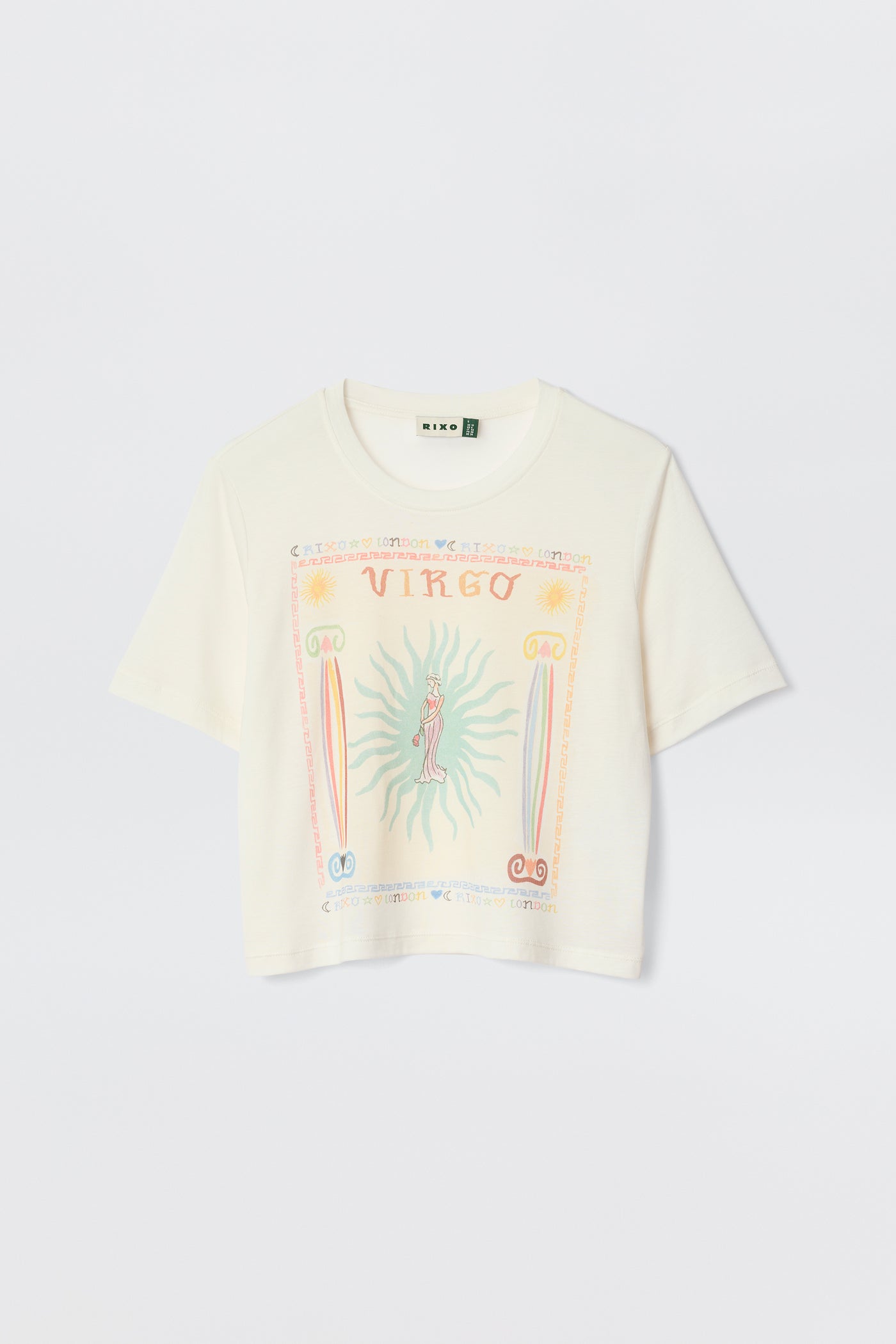 The Ria - Virgo is a white cropped short-sleeve t-shirt with a colorful artistic Virgo print, suns, symbols, and pastel accents on the front. Perfect for pairing with RIXO skirts. Shown against a plain white background.
