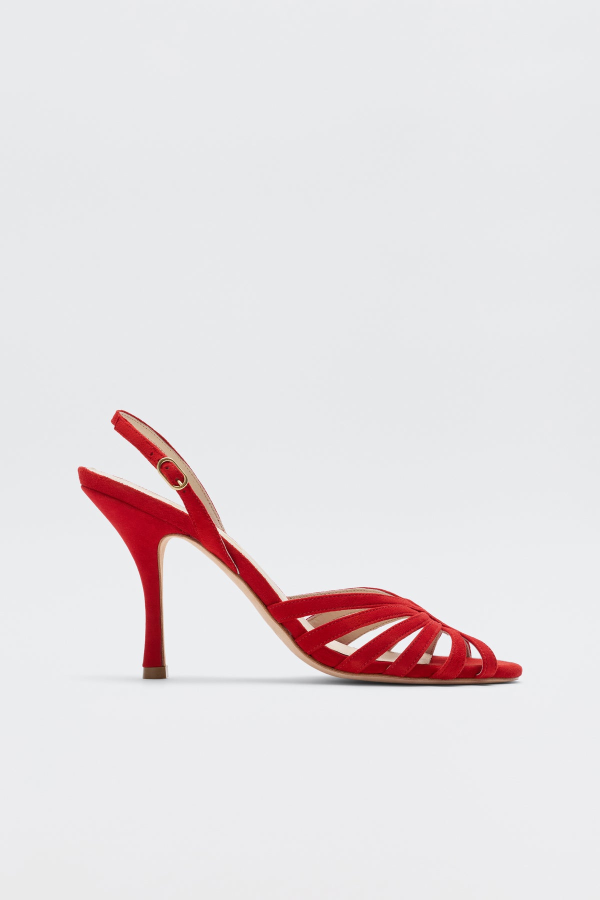 The Mavi - Red is a glamorous red high-heeled sandal with an open toe, multiple thin front straps, and an adjustable ankle buckle strap, shown in profile against a plain white background—perfect for standout women’s footwear.