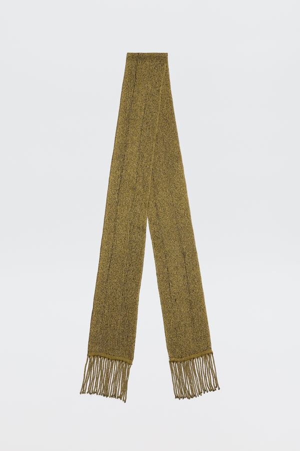 The Channing - Gold is a long, textured, vintage-inspired olive green scarf with thin fringe on both ends, displayed flat against a plain white background.