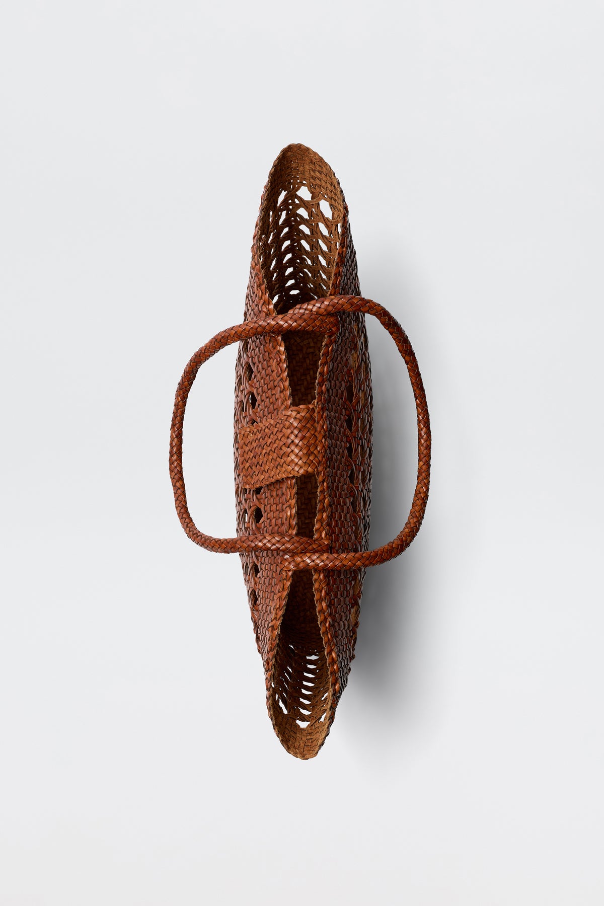 A top-down view of the Lucine - Tan, a brown woven leather handbag with two handles and an open, airy design, shown against a plain white background.