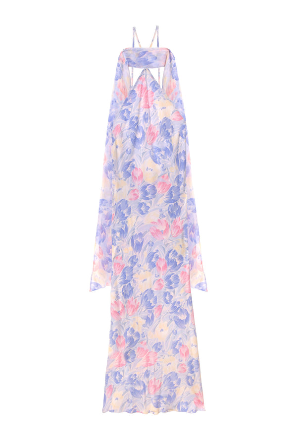 The Hayley – Tulip Fields Blue dress is a long, sleeveless silk crepe de chine halter with a flowy pastel floral print and a detachable georgette scarf for an elegant touch.