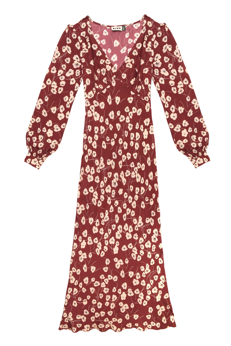 The Mavis - Autumn Cherry Maroon is an ankle-length, long-sleeve dress with a V-neck, fitted waist, and cream floral print for everyday wear.