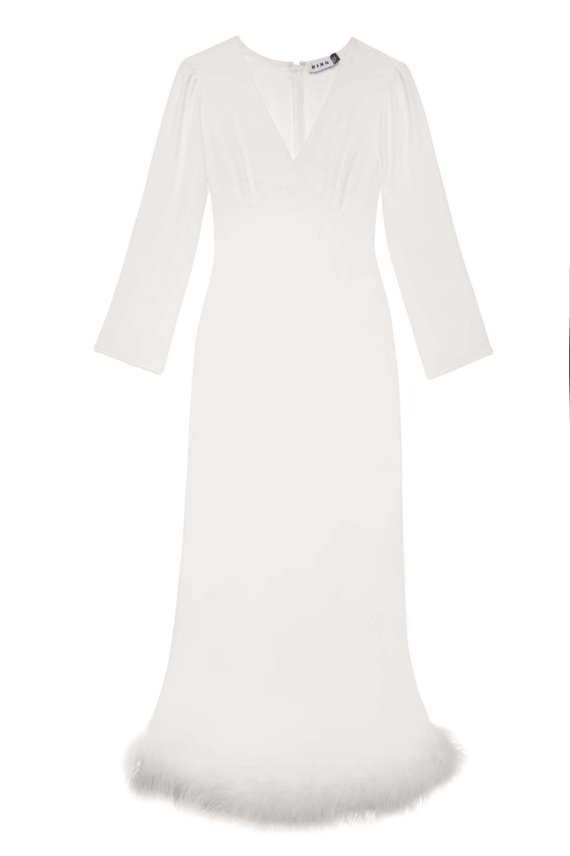 The Mya - Ivory Feathers is a floor-length, long-sleeved silk dress in white with a V-neckline and ivory feather-trimmed hem. Its fitted bodice and gently flared skirt offer a timeless silhouette, ideal for bridal occasions.