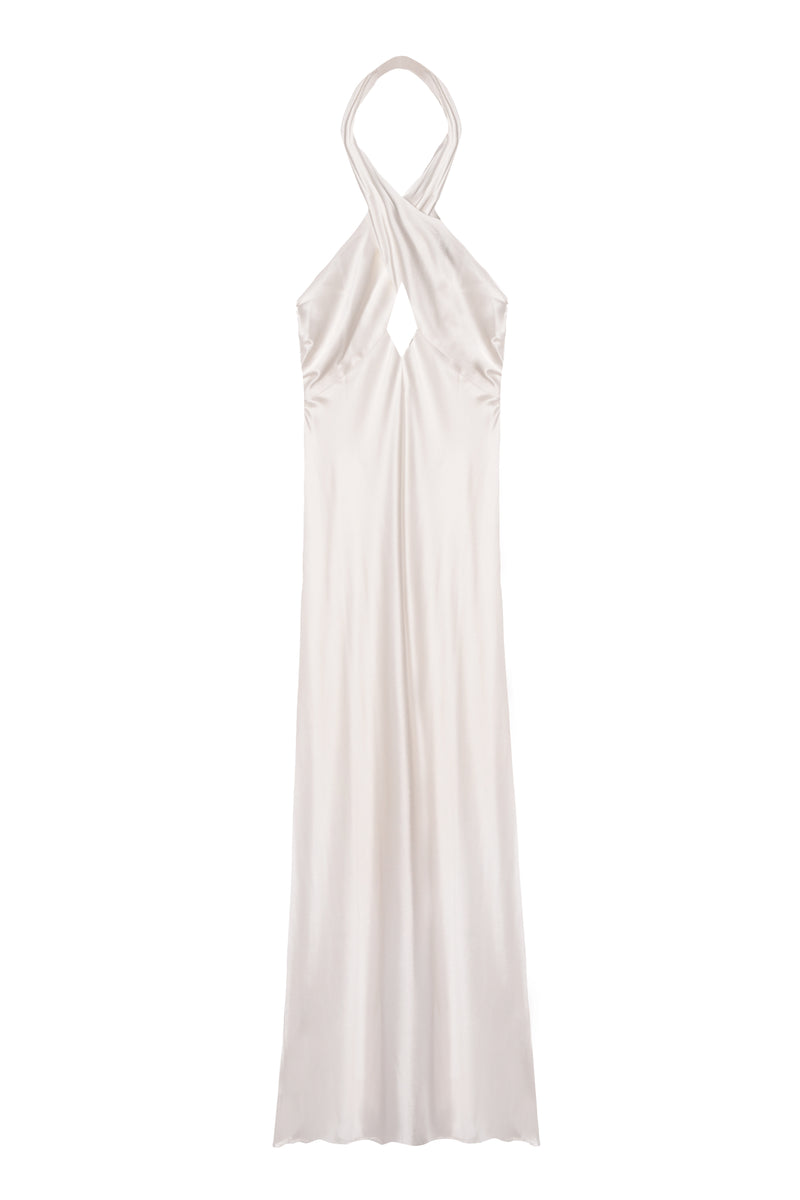The Dune - Satin Gown is a sleeveless, long white bridal dress with a crisscross halter neckline and small chest keyhole, offering an elegant and modern look.