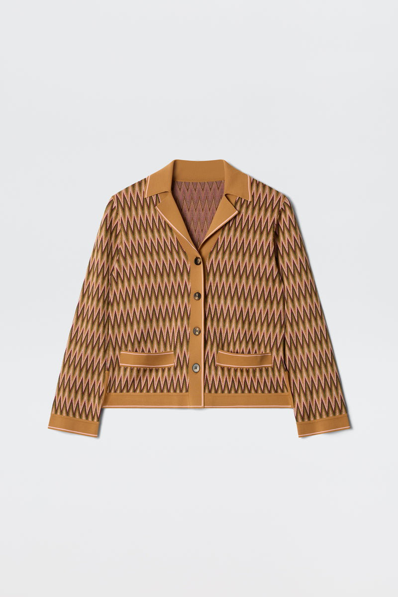 The Quinley Maeve Jacquard Multi is a brown long-sleeve jacket with beige and mauve zigzag patterns, a collar, button-up front, and two front pockets, shown laid flat on a white background.