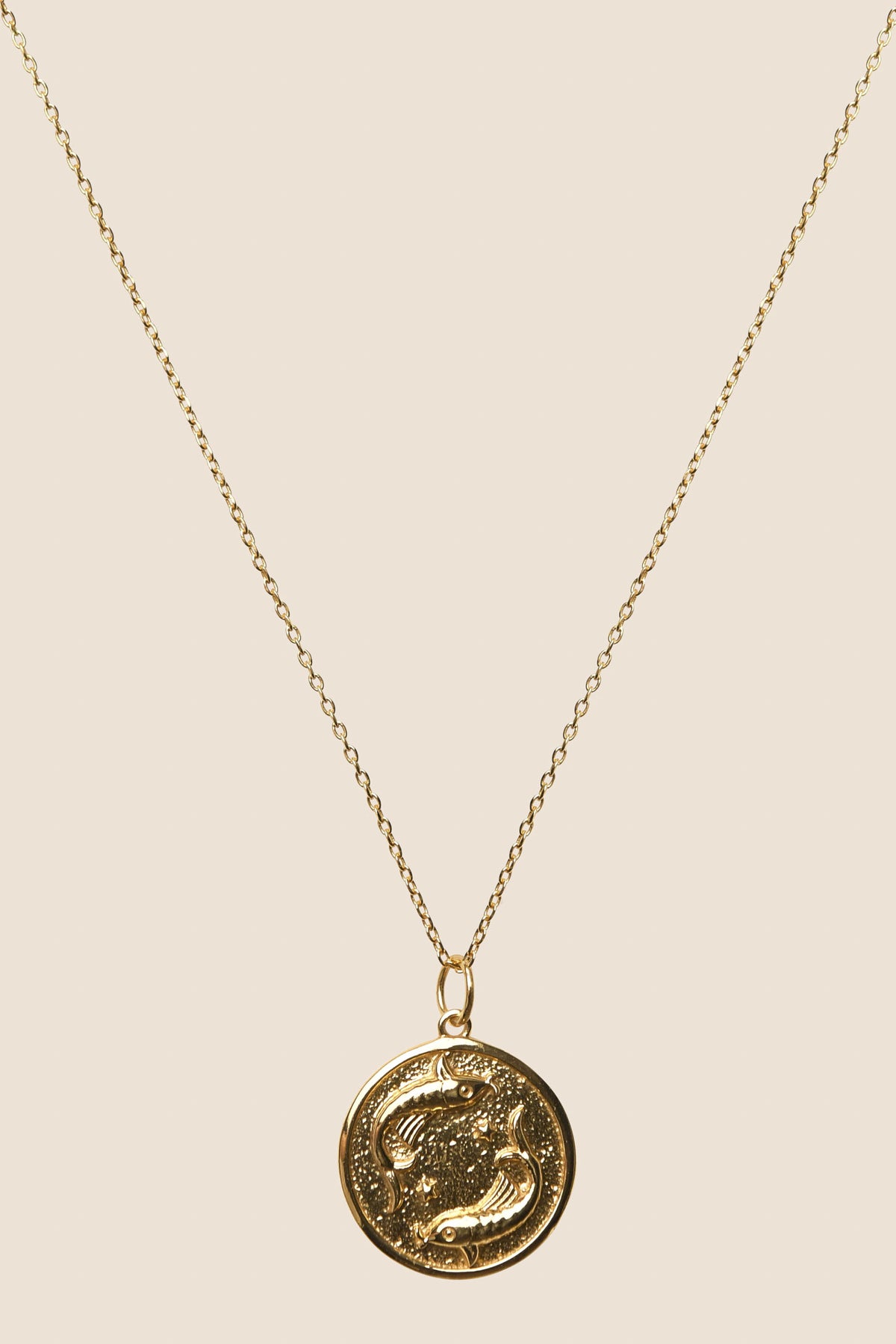 The Zodiac - Pisces necklace features a gold vermeil pendant, ideal for astrology lovers seeking a personalized zodiac accessory.
