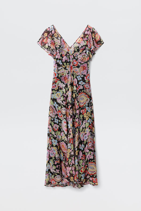 The Bexley - Cara Floral Black is a flowy, short-sleeved maxi dress with a V-neckline, showcasing a vibrant floral and paisley print on black, presented on a plain white background.