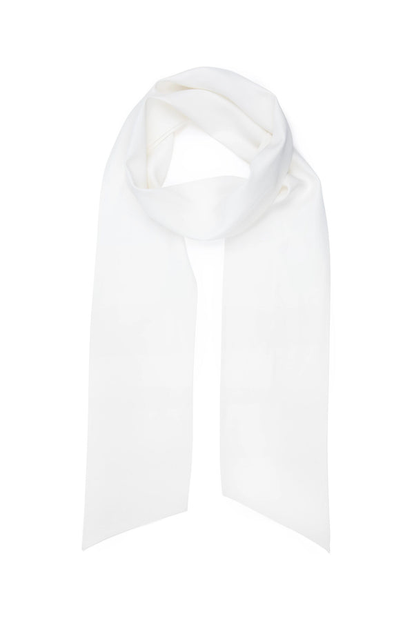The "Hermione - Satin Back Silk Crepe" is a long, plain white scarf with pointed ends, laid flat on a white background and loosely looped at the top—an elegant bridal or wedding accessory.