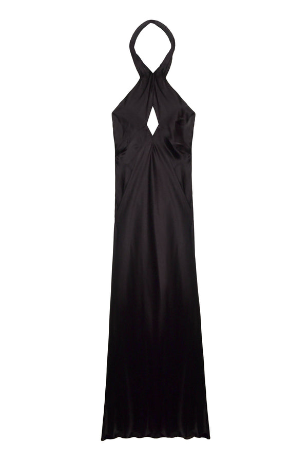 The Dune - Black is a sleeveless, floor-length silk-satin gown with a halter neckline that crosses at the neck and a diamond-shaped chest cutout, making it an elegant choice for black tie events.