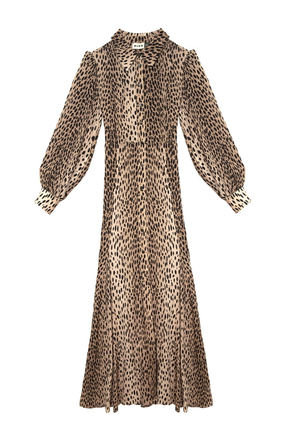 The Maddison - Antelope Spot Black is a beige, calf-length shirt dress with black leopard print, a fitted waist, collar, front buttons, and puffed long sleeves with buttoned cuffs—ideal for petite and everyday wear.