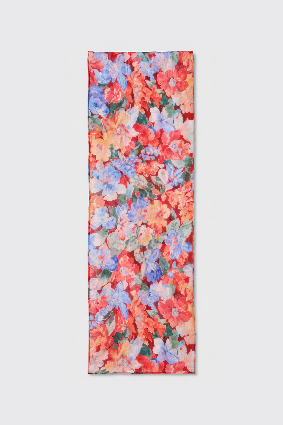 A rectangular scarf named “Julien - Chelsea Floral Red,” featuring a vibrant floral pattern in red, blue, pink, and green hues, is displayed flat on a light gray background.