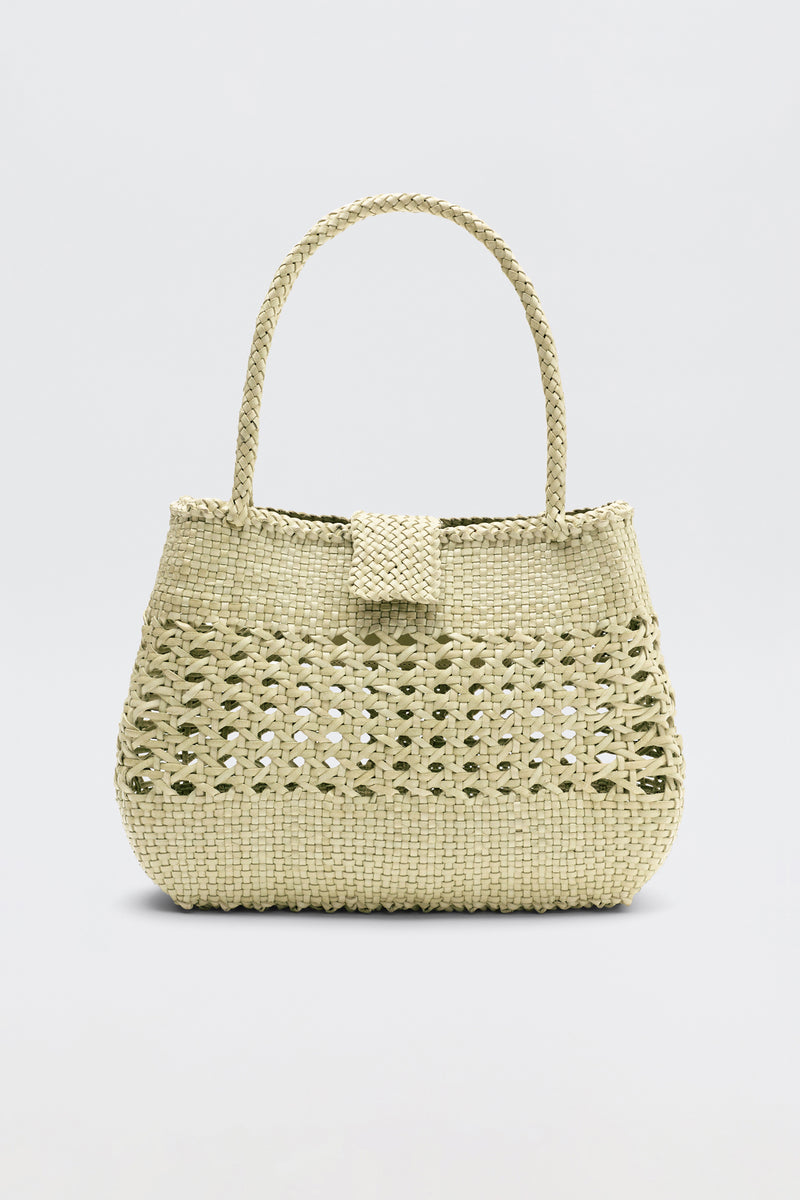 Niamh - Butter is a beige woven handbag inspired by vintage styles, featuring a braided top handle and a textured pattern, displayed against a plain light background.