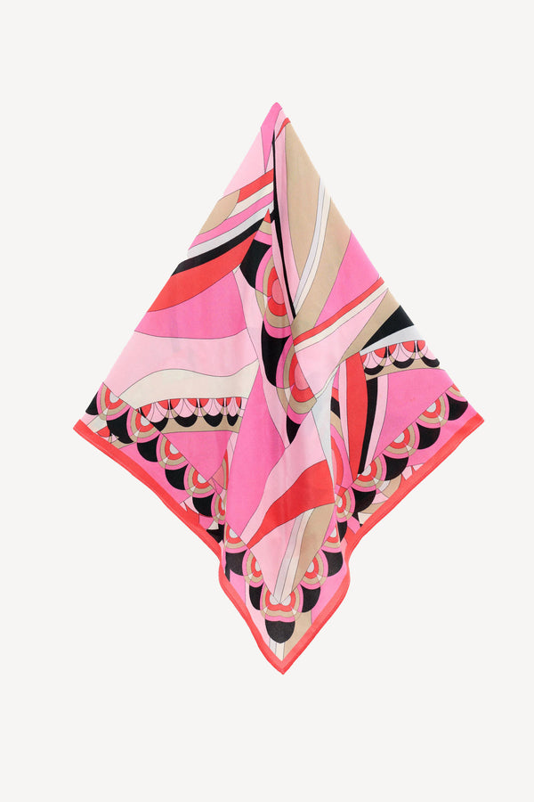 The Menno - Soho Geo Pink scarf features abstract geometric patterns in pink, beige, black, and white—this silk accessory adds versatile style to any wardrobe and is shown against a plain white background.